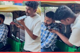 Boy bargains with auto driver